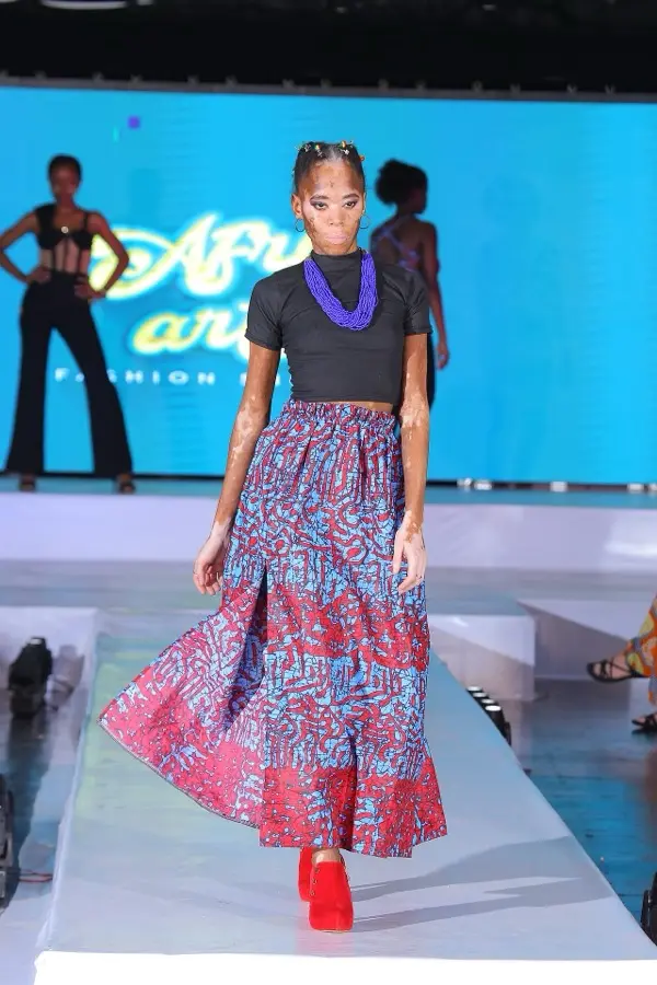 Model in an ankara two-piece on the runway