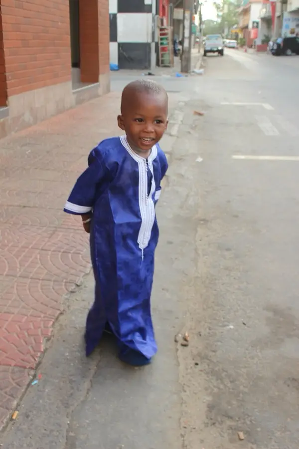 Boy in an aso-oke trimmed senator set